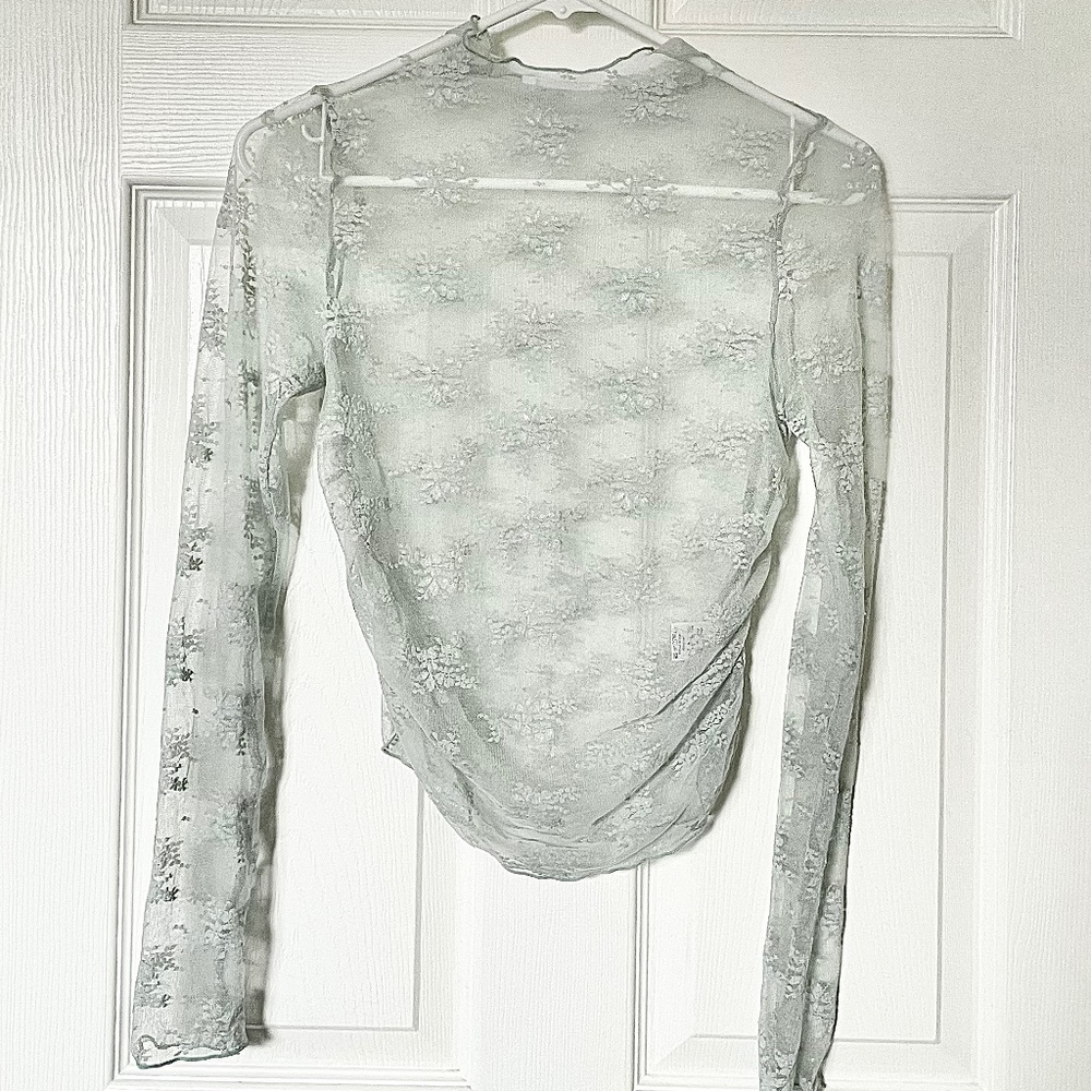Faux turtleneck sheer top